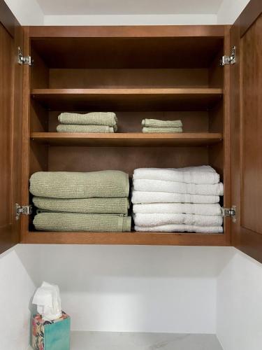 a towel rack with towels in a bathroom at The 605 House in De Smet