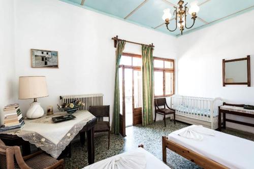 Ένα ή περισσότερα κρεβάτια σε δωμάτιο στο Holiday home frydaki sea view