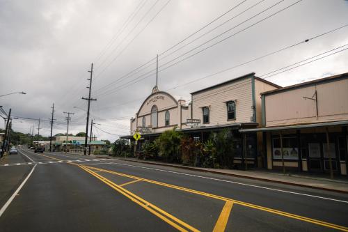 an empty street in a town with a building at Hale Polū in Waikoloa Village