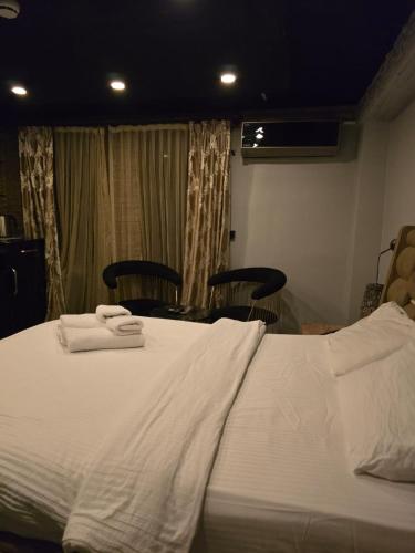 Ένα ή περισσότερα κρεβάτια σε δωμάτιο στο KLC Apart Otel