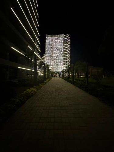 a night view of a building with lights on it at Grand Sapphire Resort Casino in Iskele