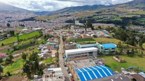an aerial view of a small town in a valley at Hostal las margaritas in Pasto