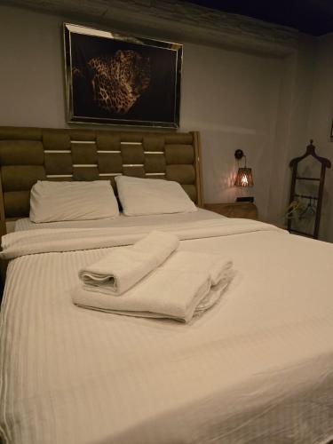 Ένα ή περισσότερα κρεβάτια σε δωμάτιο στο KLC Apart Otel