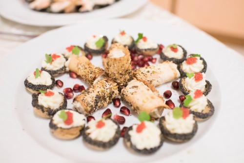 a plate of food on a white plate at Grand Hotel Stella Maris Italia in Palmi