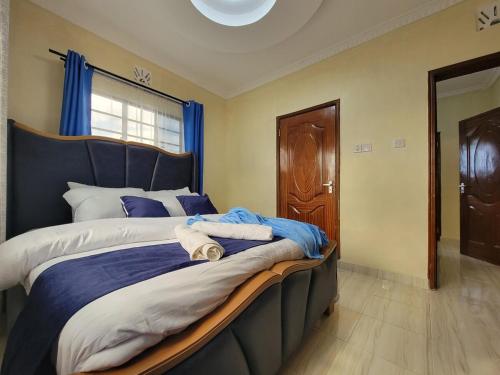 Cama o camas de una habitación en Green Gated Villa