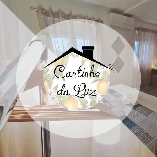 a glass table with a house with the words cantina do live at Moradia T2 em bairro pitoresco da Covilhã - Cantinho da Luz in Covilhã