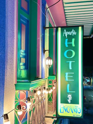 a sign on the side of a building at Encanto 3 in Santa Rosa de Cabal