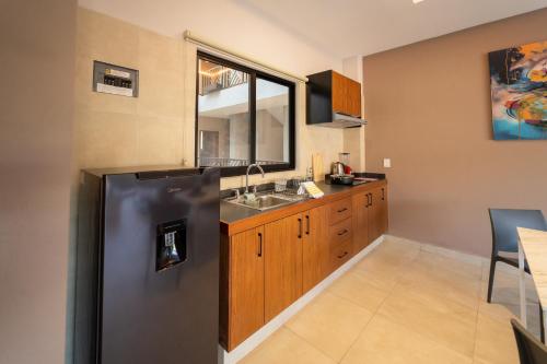 Η κουζίνα ή μικρή κουζίνα στο Terrah Suites Oaxaca