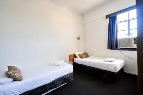 Кровать или кровати в номере Beer Deluxe Albury