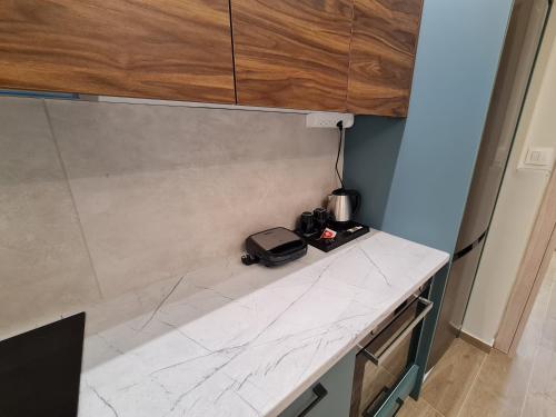 Zigos Apartmentsにあるキッチンまたは簡易キッチン