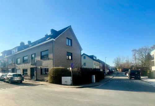 a house on the side of a street at Green Spot Meise - 15 min from Brussels with free parking & Self check-in in Meise