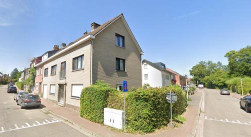 a house on the side of a street at Green Spot Meise - 15 min from Brussels with free parking & Self check-in in Meise