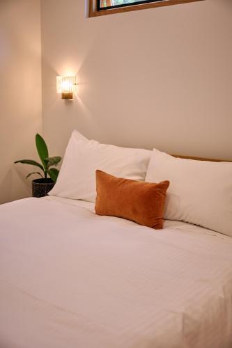 Katil atau katil-katil dalam bilik di Secluded Bellbrae sanctuary