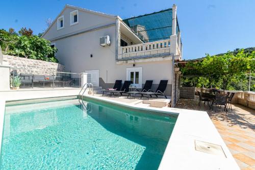 Seaside apartments with a swimming pool Tri Zala, Korcula - 558