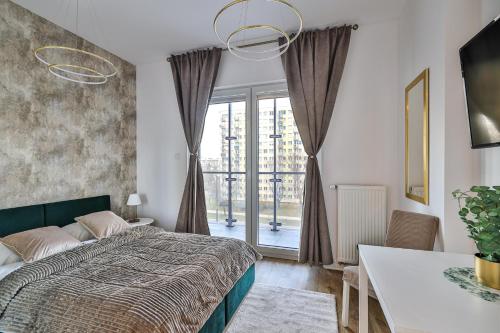 Posteľ alebo postele v izbe v ubytovaní Kasprzaka 29 Bliska Wola Tower By Perfect Apart