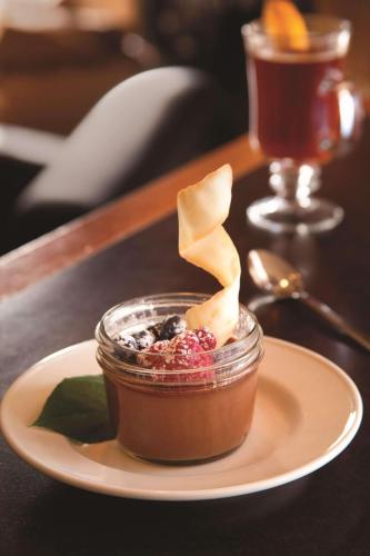 a plate with a jar of food on a table at Radisson Hotel La Crosse in La Crosse