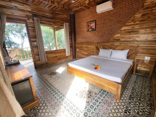 Cama o camas de una habitación en KND Wind Valley Bình Thuận