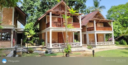 an image of a house in a resort at Tanjung Inn in Kuantan