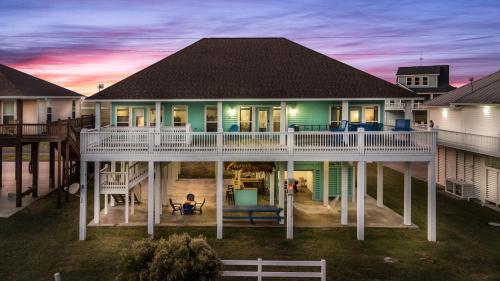 an aerial view of a house with a deck at Pet-Friendly, Arcade Games, Beach, Ocean View in Bolivar Peninsula