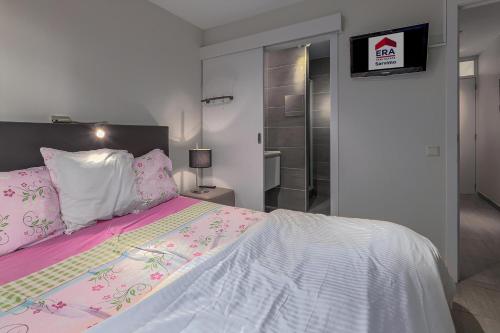 Postel nebo postele na pokoji v ubytování Asterie E 0302