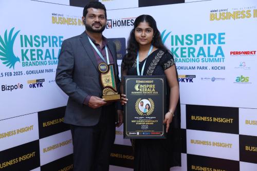 a man and a woman holding an award at Santa Maria - A Premium Boutique Homestay by the Sea I Trivandrum Airport 1mile in Trivandrum