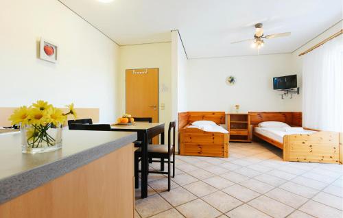 a room with a kitchen and a living room at Stunning Apartment In Jezera With Wifi in Vrelo Koreničko