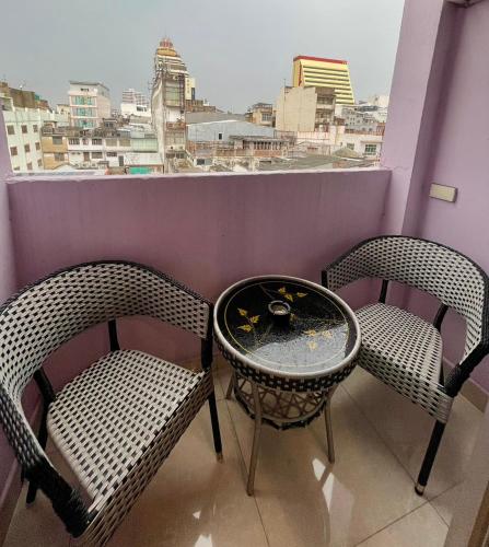 Ein Sitzbereich in der Unterkunft Sampheng Apartment