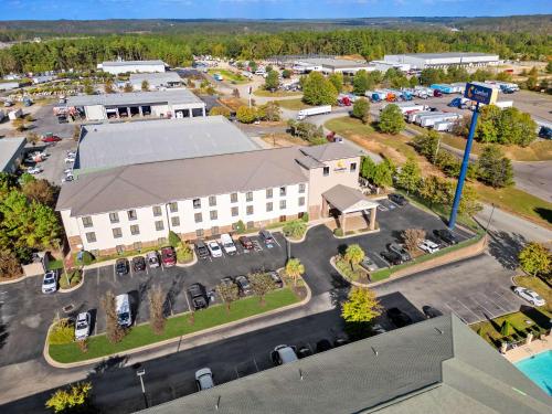 an aerial view of a building with a parking lot at Comfort Suites Augusta Riverwatch in Augusta
