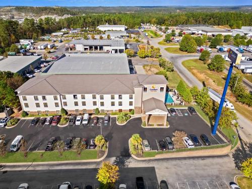 an aerial view of a building with a parking lot at Comfort Suites Augusta Riverwatch in Augusta