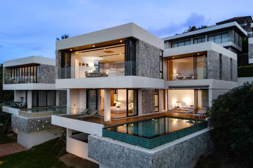 an image of a house with a swimming pool at Villa Serenity Bay, Modern 4-BR Partial Sea View villa in Plai Laem