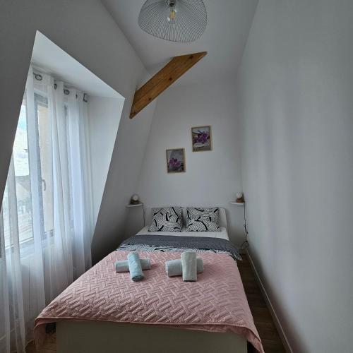 Кровать или кровати в номере Résidence Hôtel Le Relais Amélie