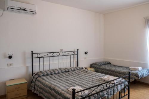 Katil atau katil-katil dalam bilik di Hotel Paradiso