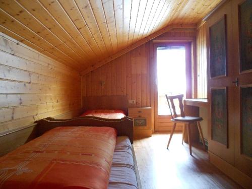 เตียงในห้องที่ Ferienwohnung Trattenhaus