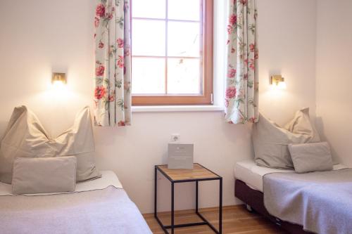 Postel nebo postele na pokoji v ubytování Appartements Stranach