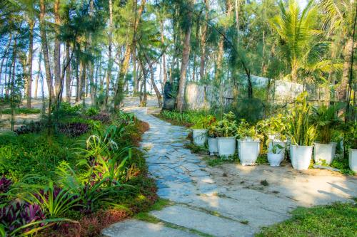 Jardín al aire libre en Hoian Beachfront Homestay