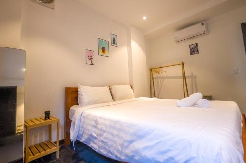 Cama o camas de una habitación en Hoian Beachfront Homestay