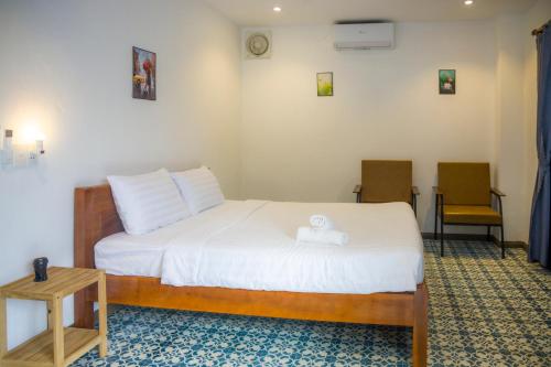 Cama o camas de una habitación en Hoian Beachfront Homestay