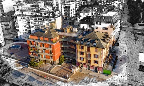 an overhead view of a building in a city at Residenza IL CASTELLO in Sondrio