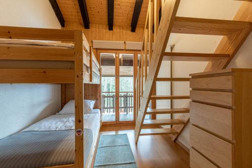 Postel nebo postele na pokoji v ubytování Mélèzes R-S MOUNTAIN & SKI LIFT apartements