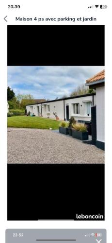 Capture d'écran d'une photo d'une maison dans l'établissement Les cottages de Fabienne et Orlando 10 personnes, à Calais