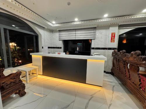 a kitchen with a counter in a room at 168 Hotel in Ho Chi Minh City