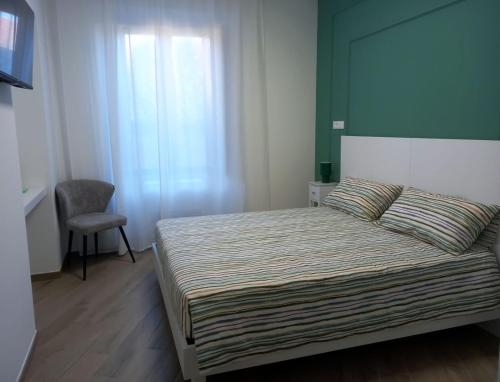 Katil atau katil-katil dalam bilik di Palazzo Schirù