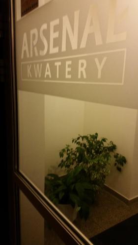 a window with a sign that reads emergency k watery at Arsenał Kwatery in Włocławek