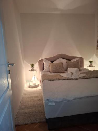 Postel nebo postele na pokoji v ubytování Apartman Demetra