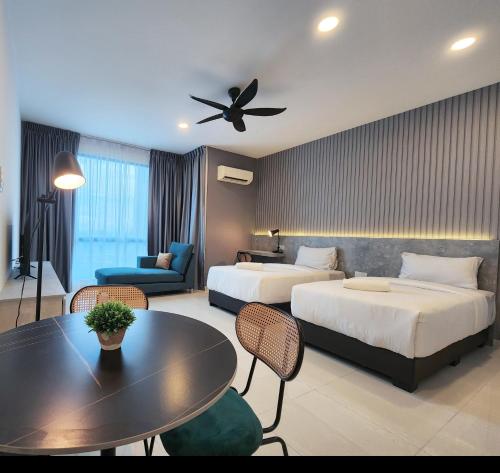 Ένα ή περισσότερα κρεβάτια σε δωμάτιο στο SKS Pavillion Suites