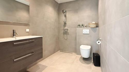 Ένα μπάνιο στο Duinbries by Droomvilla