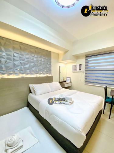 En eller flere senge i et værelse på Studio unit 50b t1