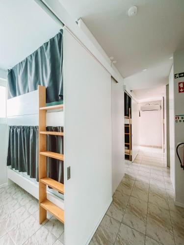 Postel nebo postele na pokoji v ubytování Arca Nova Hostel - Caminha