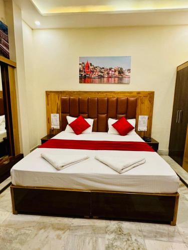 Un ou plusieurs lits dans un hébergement de l'établissement Hotel Chitrakoot