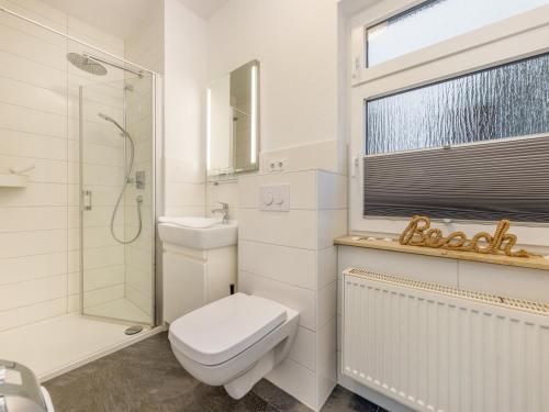 Ένα μπάνιο στο Ferienwohnung Strandmuschel in der Residenz Clara Sophia